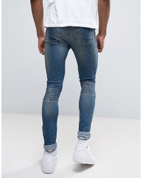 Asos Tall Super Skinny Jeans With Double Zip And Biker Details In Mid Blue Wash