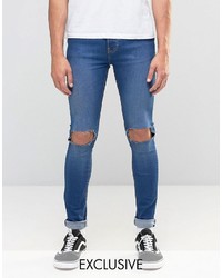 Reclaimed Vintage Washed Super Skinny Jeans With Knee Rips