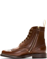 Foot the Coacher Brown Leather Brogue Boots, $1,100 | SSENSE