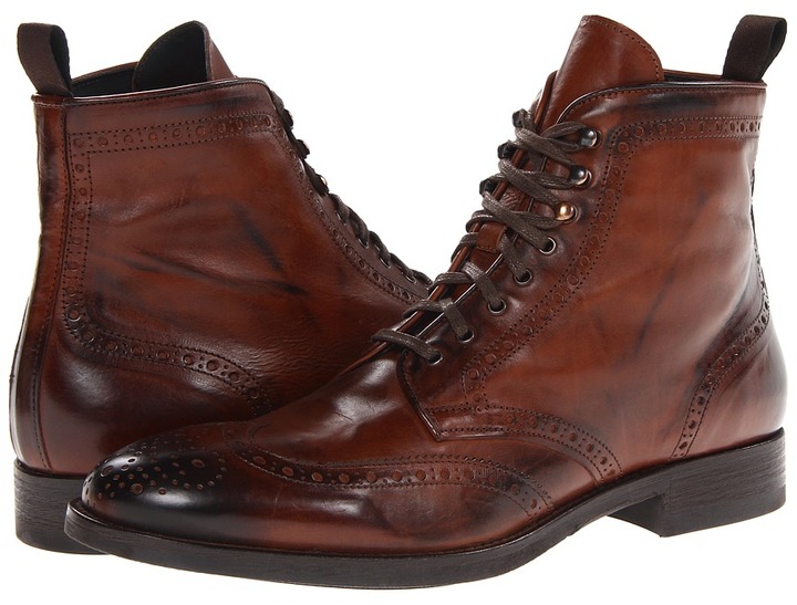 https://cdn.lookastic.com/brown-leather-brogue-boots/new-york-brennan-original-34905.jpg