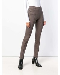 https://cdn.lookastic.com/brown-leggings/toteme-check-pattern-leggings-7245605-medium.jpg