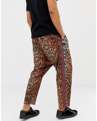 ASOS DESIGN Oversized Tapered Trousers In Leopard Print With Side Tape