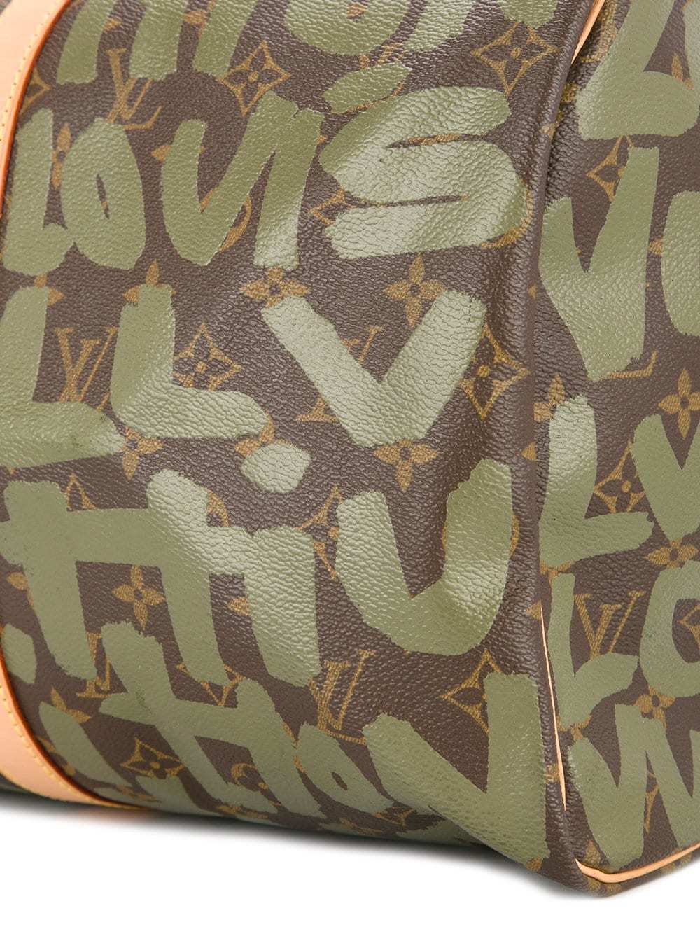Louis Vuitton Vintage Keepall 50 Travel Bag, $6,506, farfetch.com