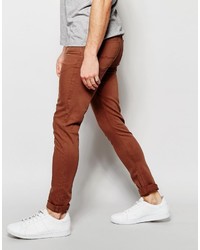 Asos Brand Super Skinny Jeans In Rust