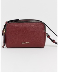 Women's Burgundy Leather Crossbody Bags by Calvin Klein | Lookastic