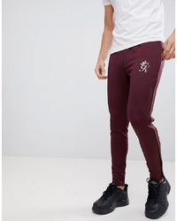 Gym King Skinny Joggers In Burgundy With Gold Piping