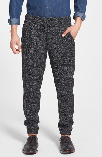 https://cdn.lookastic.com/charcoal-herringbone-wool-dress-pants/publish-brand-trouski-wool-blend-herringbone-jogger-pants-original-124327.jpg