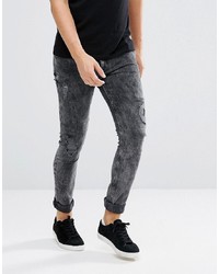 ASOS DESIGN Asos Super Skinny Jeans In Vintage Washed Black With Rip And Repair