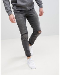 ASOS DESIGN Skinny Jeans In Vintage Washed Black With Knee Rips