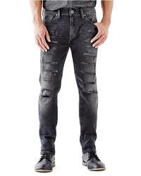 GUESS Slim Tapered Jeans In Worn Black Destroy Wash
