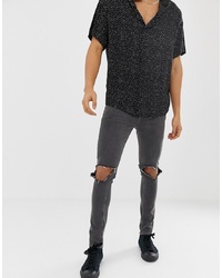 ASOS DESIGN Super Skinny Jeans In Washed Black With Open Knee Rips