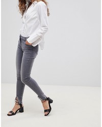 Parisian Skinny Jeans With Diagonal Raw Hem