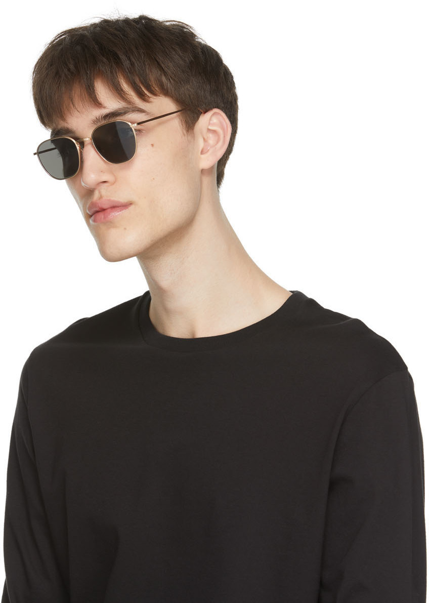 The Row Gold Oliver Peoples Edition Board Meeting 2 Sunglasses, $485 |  SSENSE | Lookastic