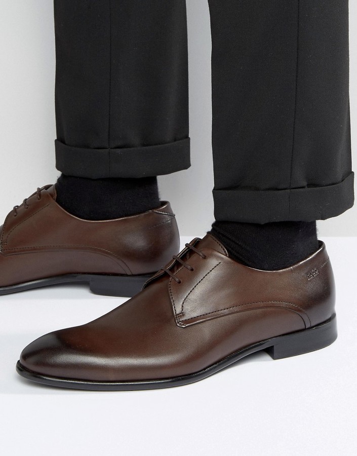 Мужская обувь hugo. Ботинки Хуго босс мужские. Кожаные ботинки Хуго босс. Ботинки женские Hugo Boss коричневые.