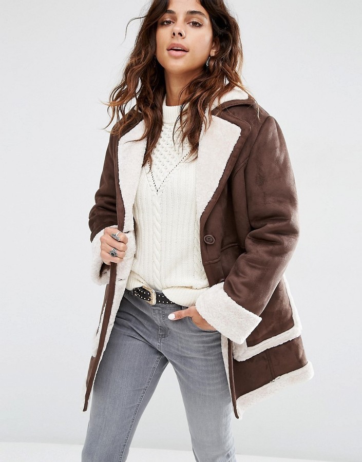 https://cdn.lookastic.com/dark-brown-shearling-coat/vintage-style-faux-shearling-coat-original-805474.jpg