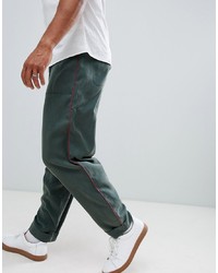 ASOS DESIGN Wide Balloon Trousers In Dark Green Drapey Fabric With Side Piping