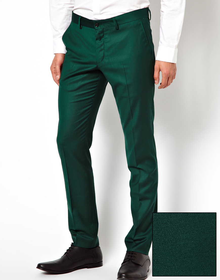 Темно зеленые брюки