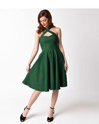 Unique Vintage 1950s Emerald Green Cross Halter Rita Flare Dress