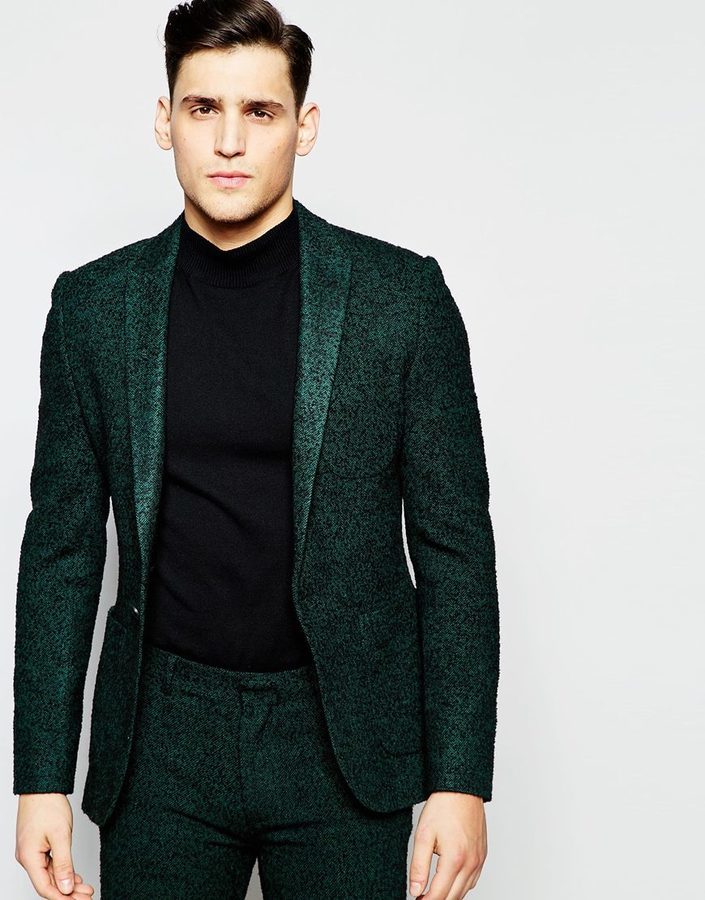 green herringbone suit