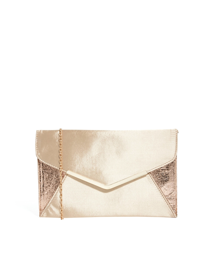 dune gold clutch bag