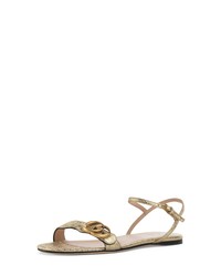 Women's Gold Flat Sandals by Gucci | Lookastic