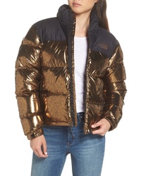 gold north face jacket
