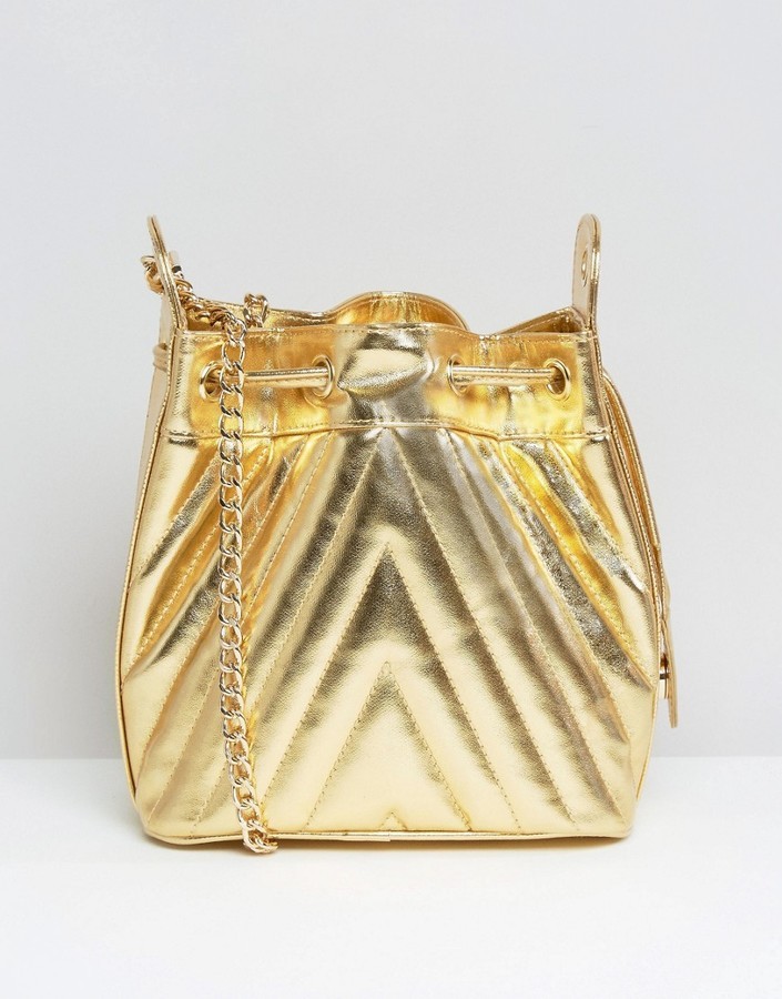 Gold quilted 2024 bag