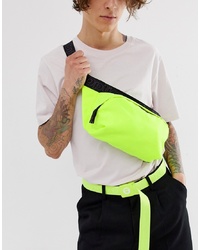 ASOS DESIGN Large Cross Body Bum Bag In Neon Yellow With Slogan