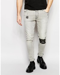 Asos Super Skinny Jeans With Printed Knee
