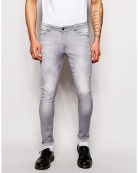 Asos Brand Extreme Super Skinny Jeans In Jersey With Rip And Repair