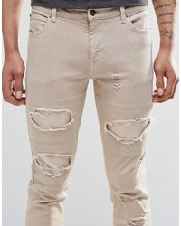 Asos Brand Skinny Jeans With Extreme Rips In Stone