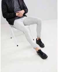 ASOS DESIGN Super Skinny Jeans In Light Grey With Abrasions