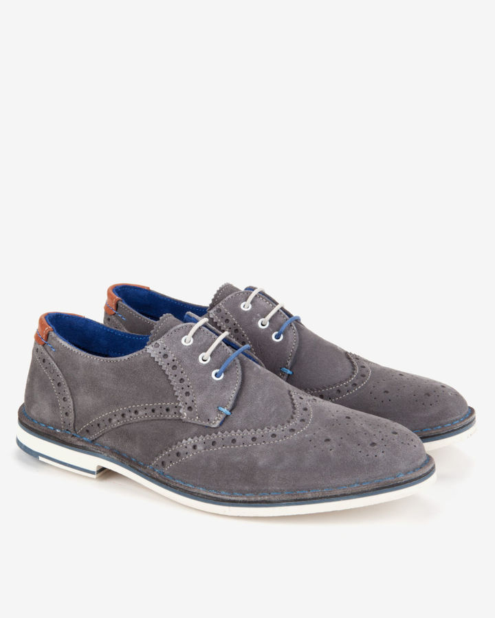 grey suede wingtip shoes