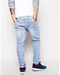 Asos Brand Stretch Tapered Jeans In Light Wash