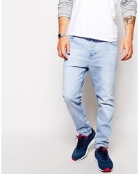 Asos Brand Stretch Tapered Jeans In Light Wash