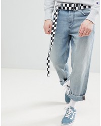 ASOS DESIGN Skater Jeans In Light Wash Blue With Checkerboard Belt
