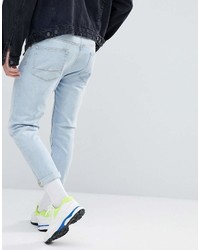 Asos Tapered Jeans In Light Wash Blue With Abrasions