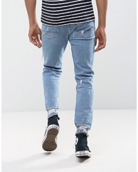 Asos Tapered Jeans In Vintage Light Wash Blue With Heavy Rips