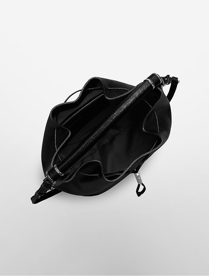 Buy the Calvin Klein Leah Drawstring Bucket Shoulder Bag Dark