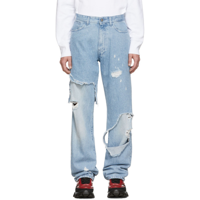 Raf Simons Blue Destroyed Relaxed Fit Jeans, $1,035 | SSENSE