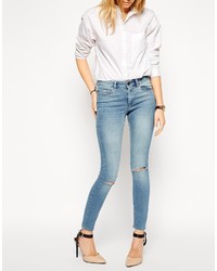 Asos Collection Lisbon Skinny Mid Rise Ankle Grazer Jeans In Brooklyn Light Wash Blue With Ripped Knees