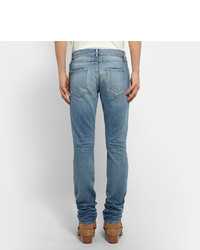 Saint Laurent Slim Fit 17cm Hem Distressed Washed Denim Jeans