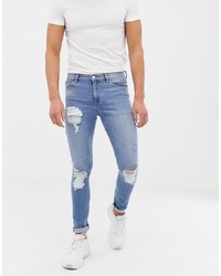 ASOS DESIGN 125oz Super Skinny Jeans In Vintage Light Wash With Heavy Rips