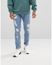 ASOS DESIGN Asos Skinny Jeans In Mid Wash With Chevron Print And Rips