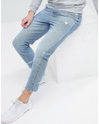 ASOS DESIGN Asos Skinny Twisted Seam Jeans In Light Wash Blue With Abrasions