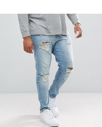 ASOS DESIGN Plus Skinny Jeans In Light Wash With Heavy Rips