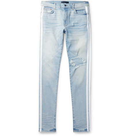 distressed track denim jeans