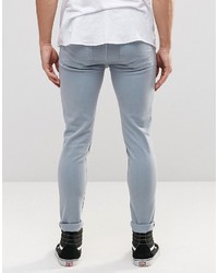 Asos Brand Super Skinny Jeans With Extreme Rips In Light Blue