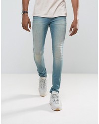 ASOS DESIGN Asos Super Skinny Jeans In Mid Wash Blue