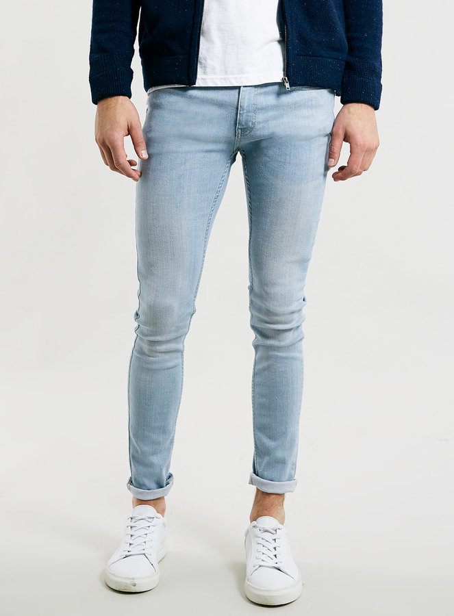 blue spray on skinny jeans